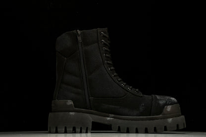 Balenciaga Distressed Combat Strike Boots