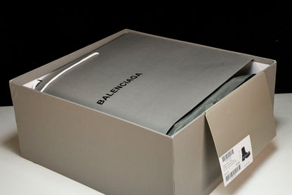 Balenciaga Distressed Combat Strike Boots