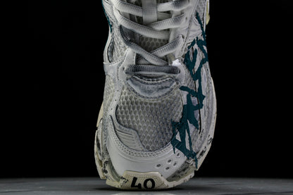 Balenciaga
Runner Graffiti (W&B)